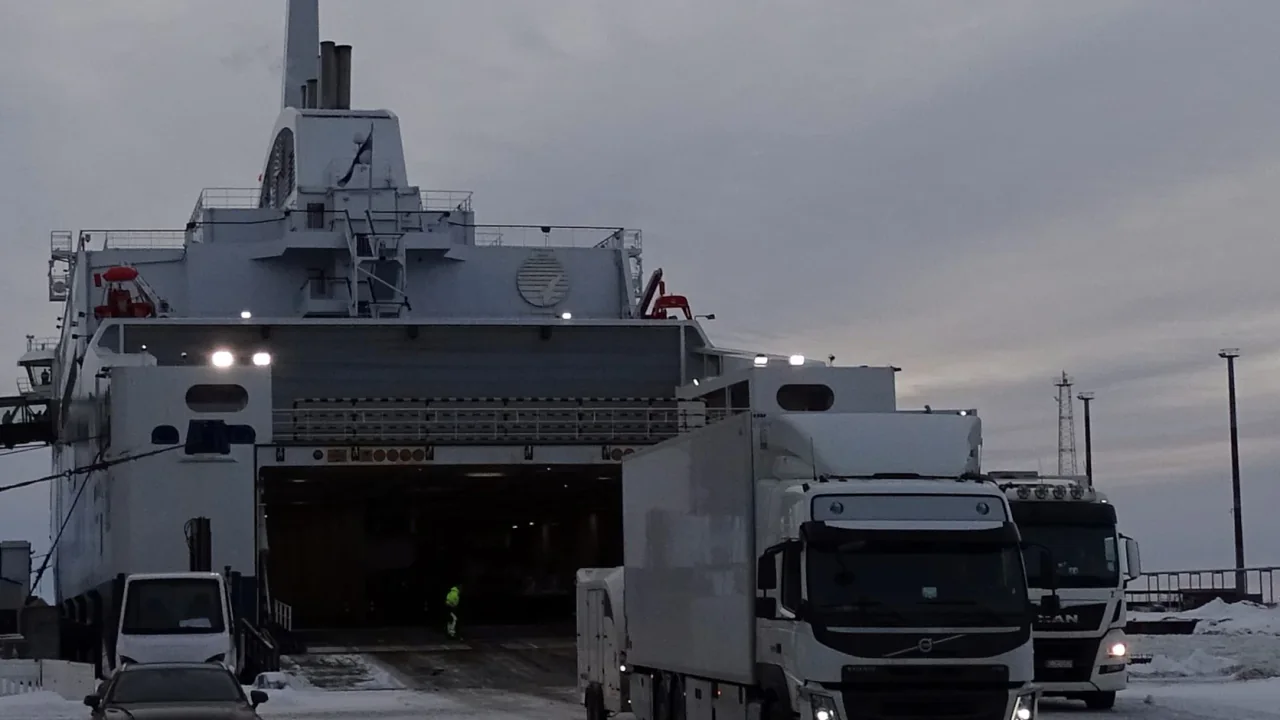 Vehicles unloading from Aurora Botnia in winter